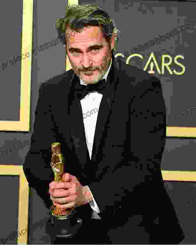 Joaquin Phoenix In A Custom Made Stella McCartney Tuxedo Made From Recycled Materials At The 2020 Academy Awards Made For Each Other: Fashion And The Academy Awards
